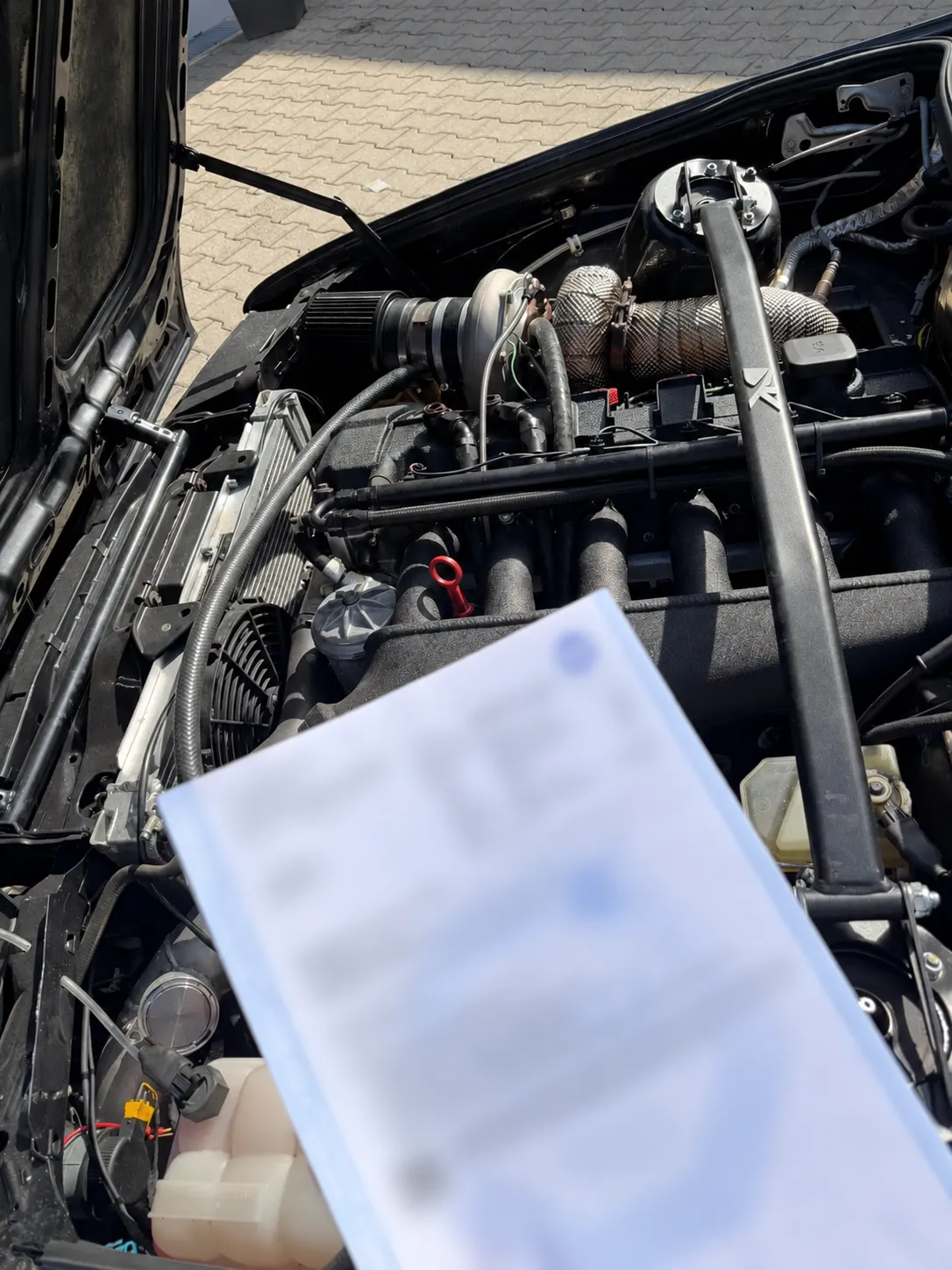 Unleserlich verwischter TÜV-Bericht-1